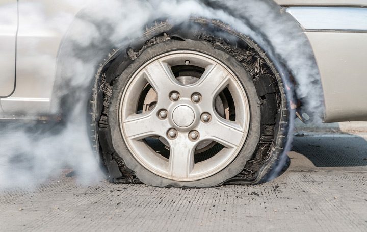 A blown out tyre on a car