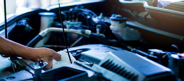 open car bonnet checking oil levels