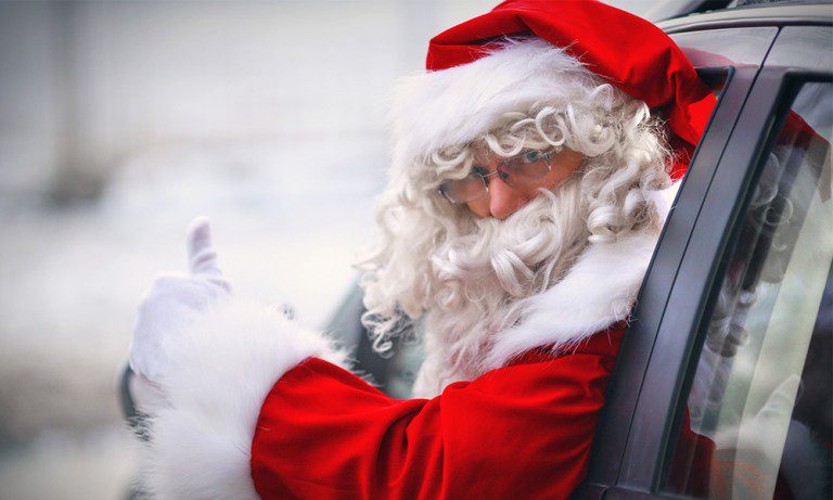 Father Christmas in a car